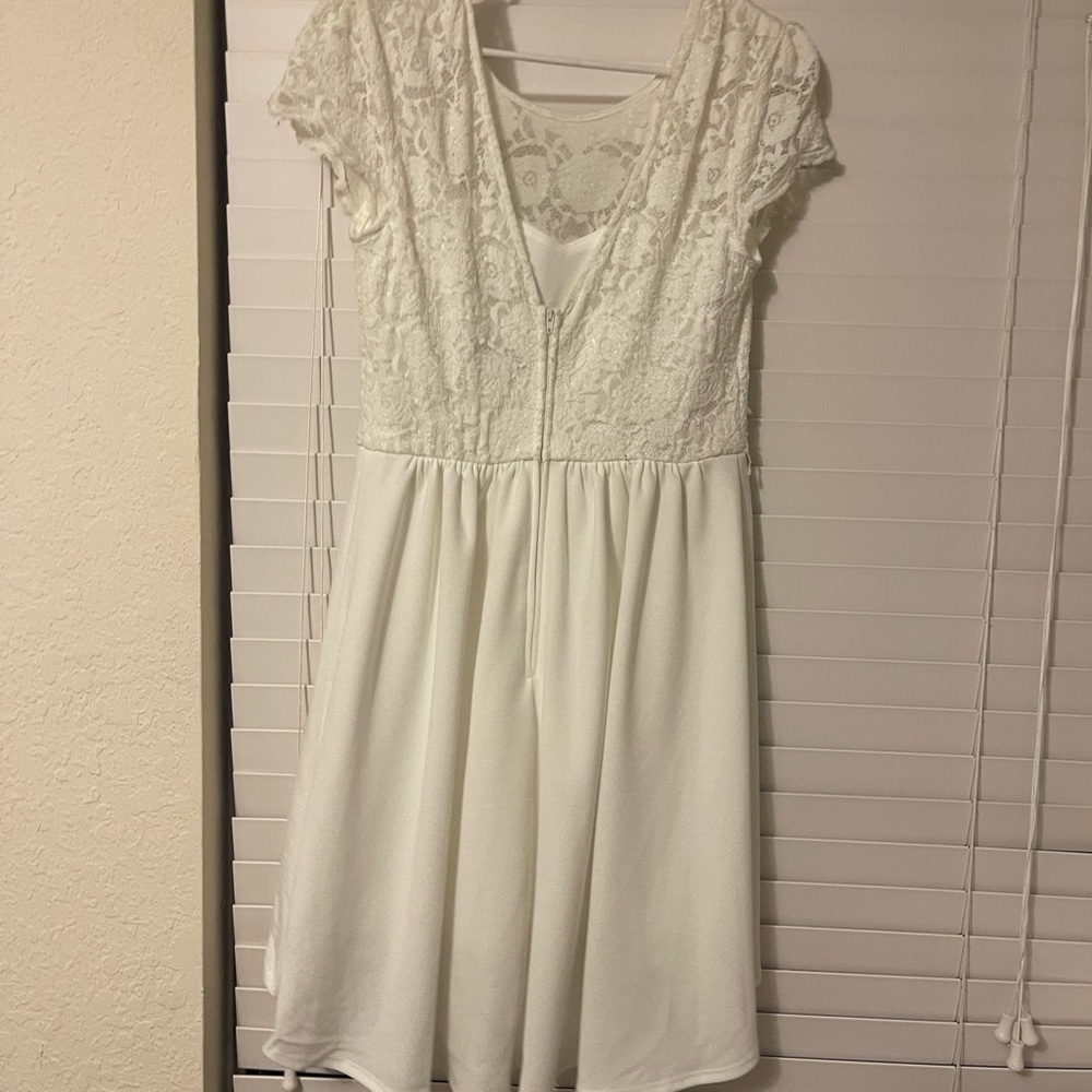 White knee length dress.